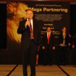 Image of Don Roberts on stage at Mega Partnering
